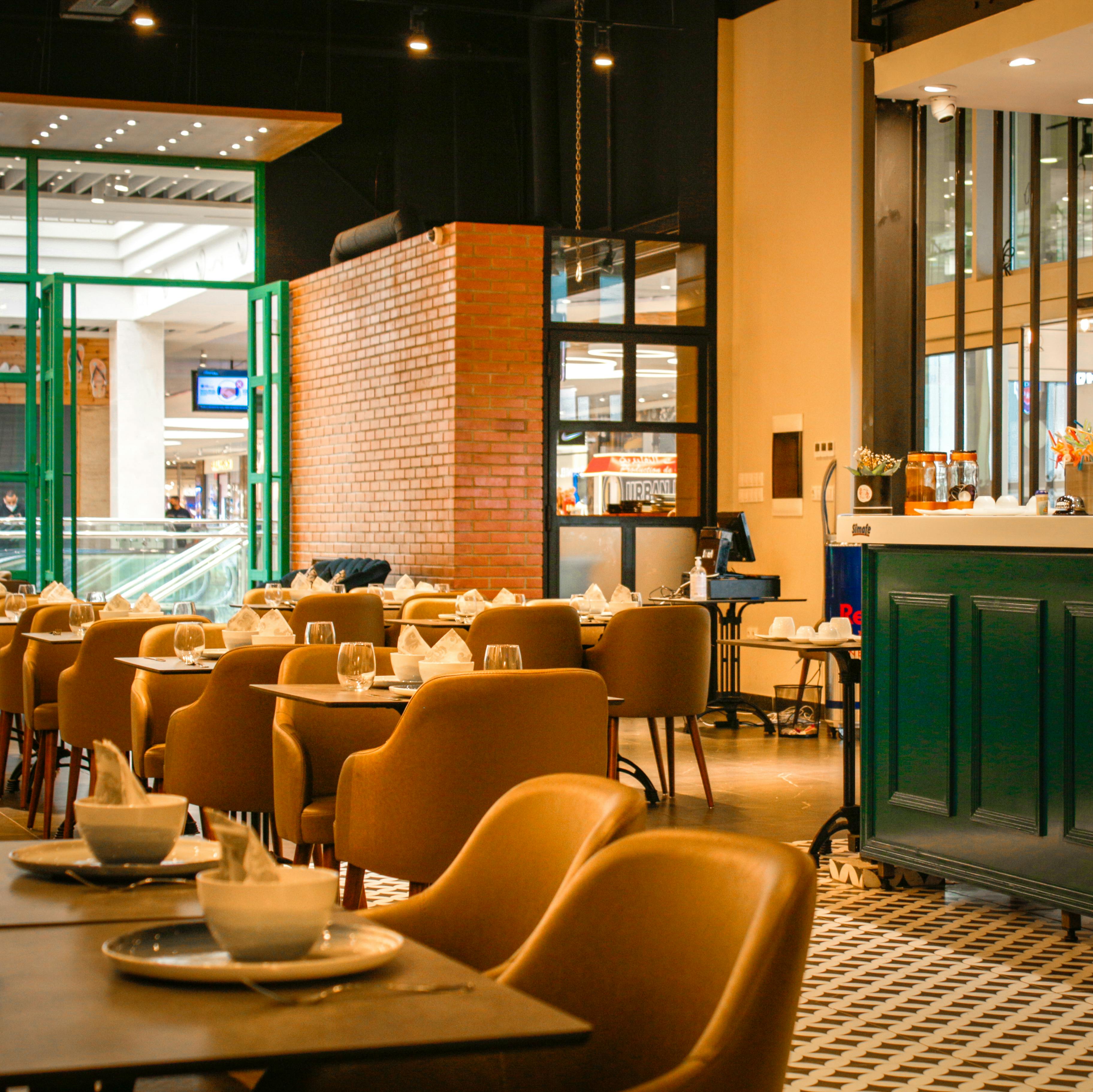 A stylish café interior showcasing contemporary design and elegant seating arrangements.